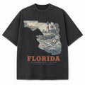 Vintage Washed Florida Coastal Graphic Tee in Black, front view on a white background