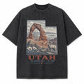 Vintage Washed Utah Delicate Arch Graphic Tee in Black, front view on a white background