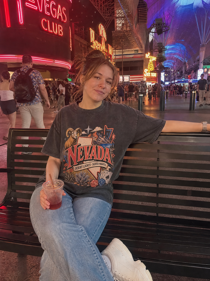 Colorful Alabama artwork on a washed black T-shirt